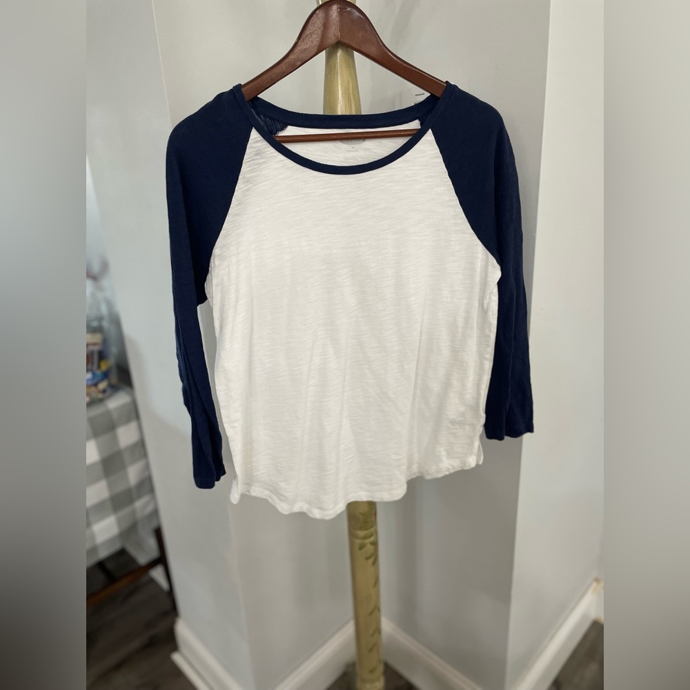 White and navy long sleeve tee.